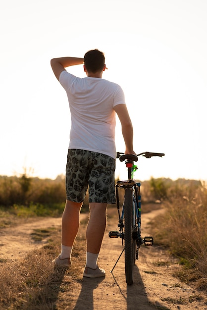 Free photo full shot of a man looking away