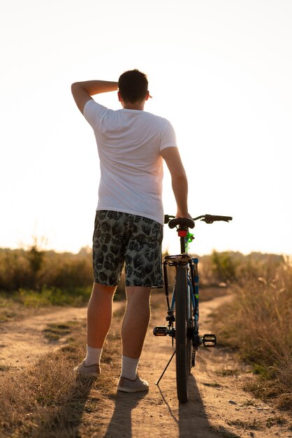 Full shot of a man looking away