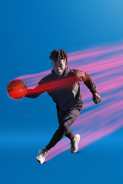 Full Shot Man Playing Basketball Free Stock Photo