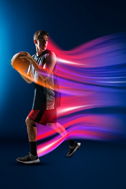 Full shot man playing basketball | Free Download Stock Photo