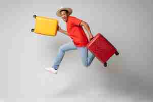 Free photo full shot man posing with baggage