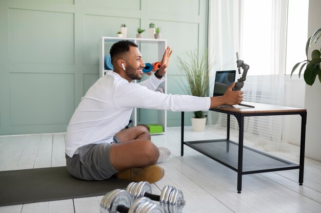full shot man recording himself