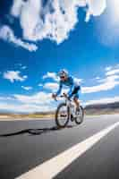 Free photo full shot man riding bicycle outdoors