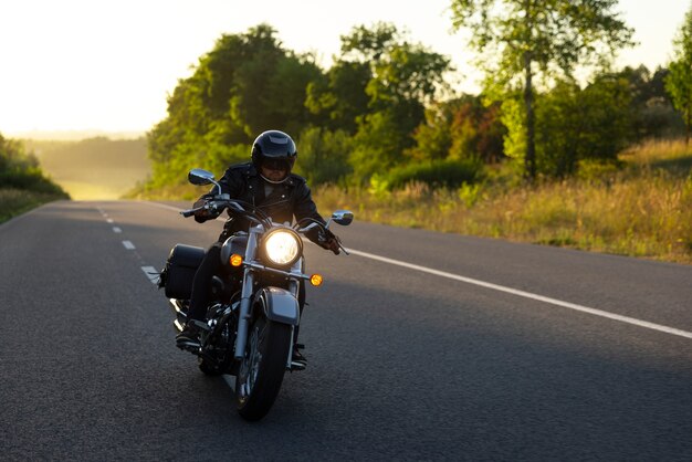 Full shot man riding a motorbike