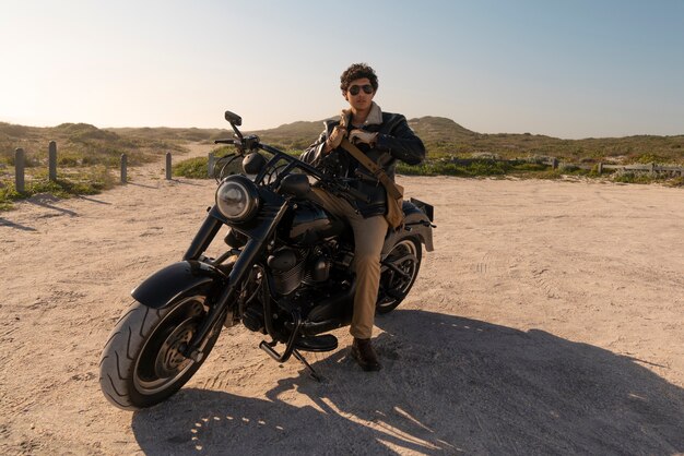 Full shot man riding a motorbike