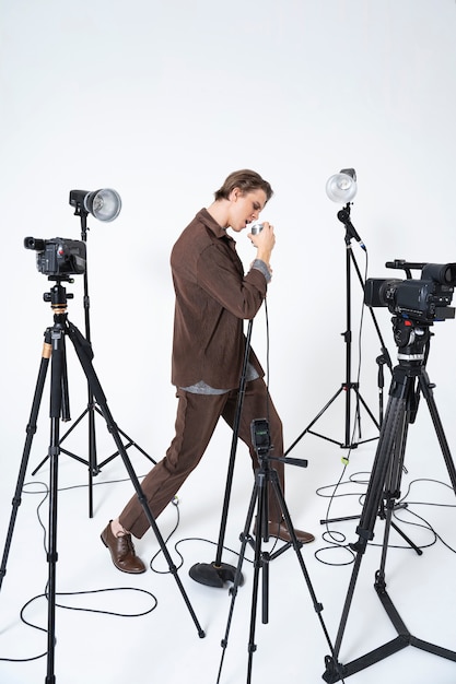 Full shot man singing with microphone