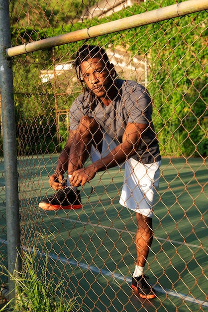 Full shot man on soccer field