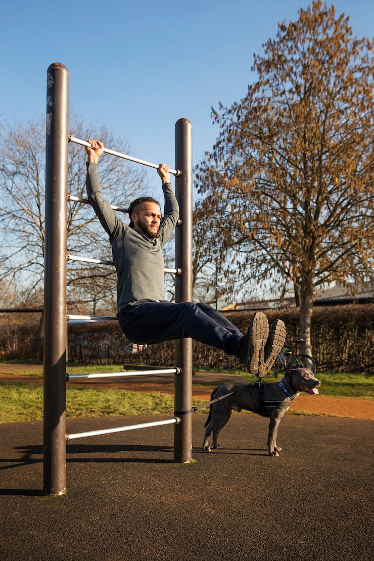 Free Photo full shot man training with dog outdoors