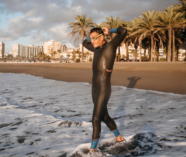 Full shot man wearing swimsuit