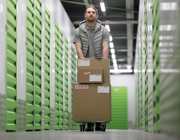 Full shot man working at logistic center