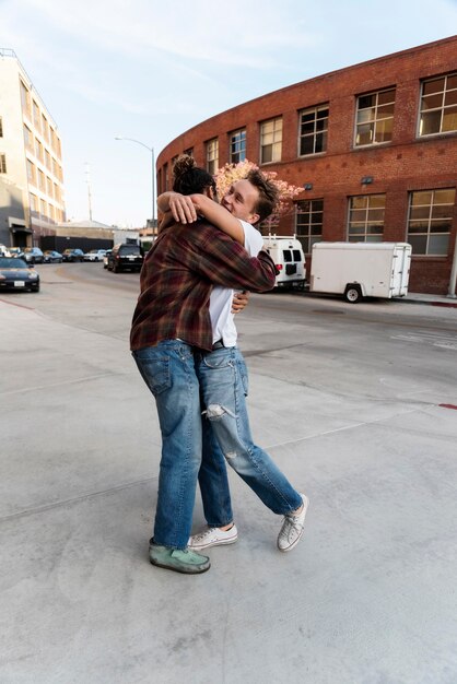 Full shot men hugging