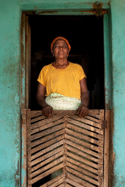 Free photo full shot old woman exterior portrait