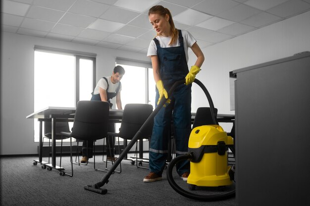 full shot people cleaning office