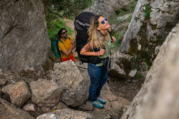 Free photo full shot people hiking together