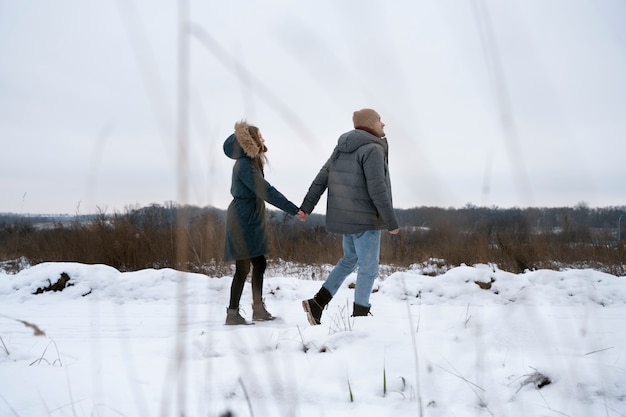 Full shot people holding hands