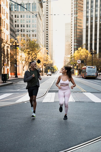 Full shot people jogging together