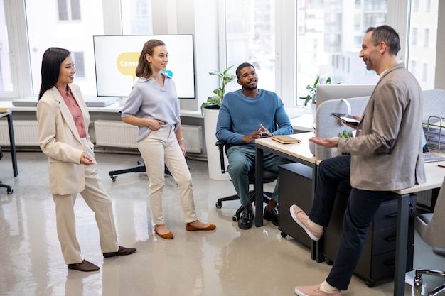 Full shot people learning language at work