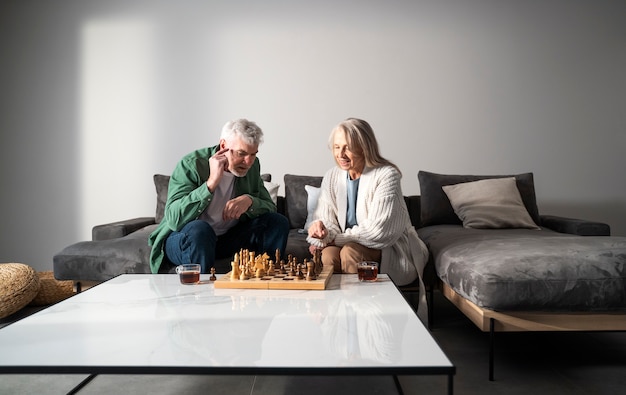 Full shot people playing chess