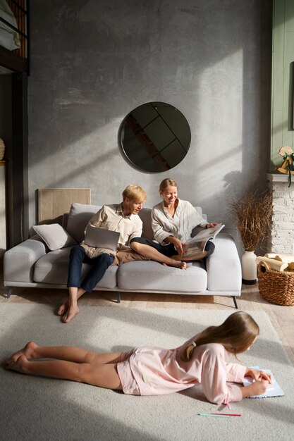 full shot people relaxing indoors
