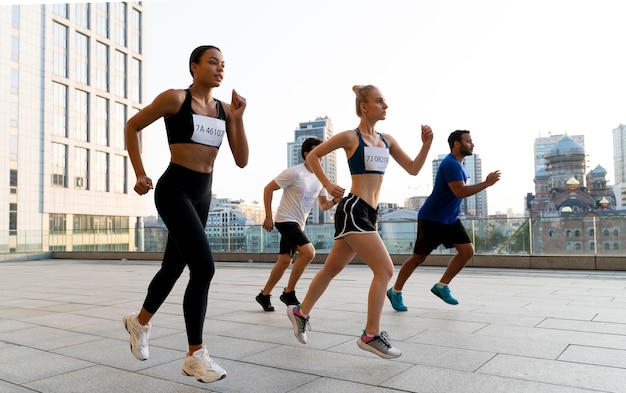 Free photo full shot people running together outside