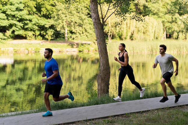 Full shot people running together