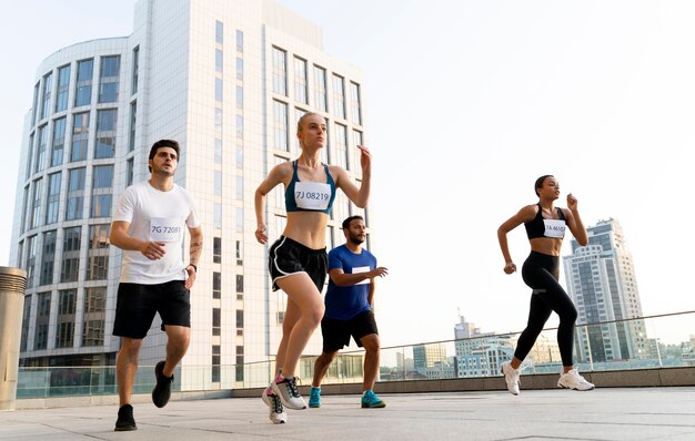 full shot people running together