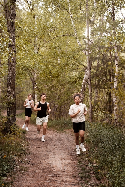 Full shot people running together