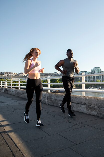 Full shot people running together