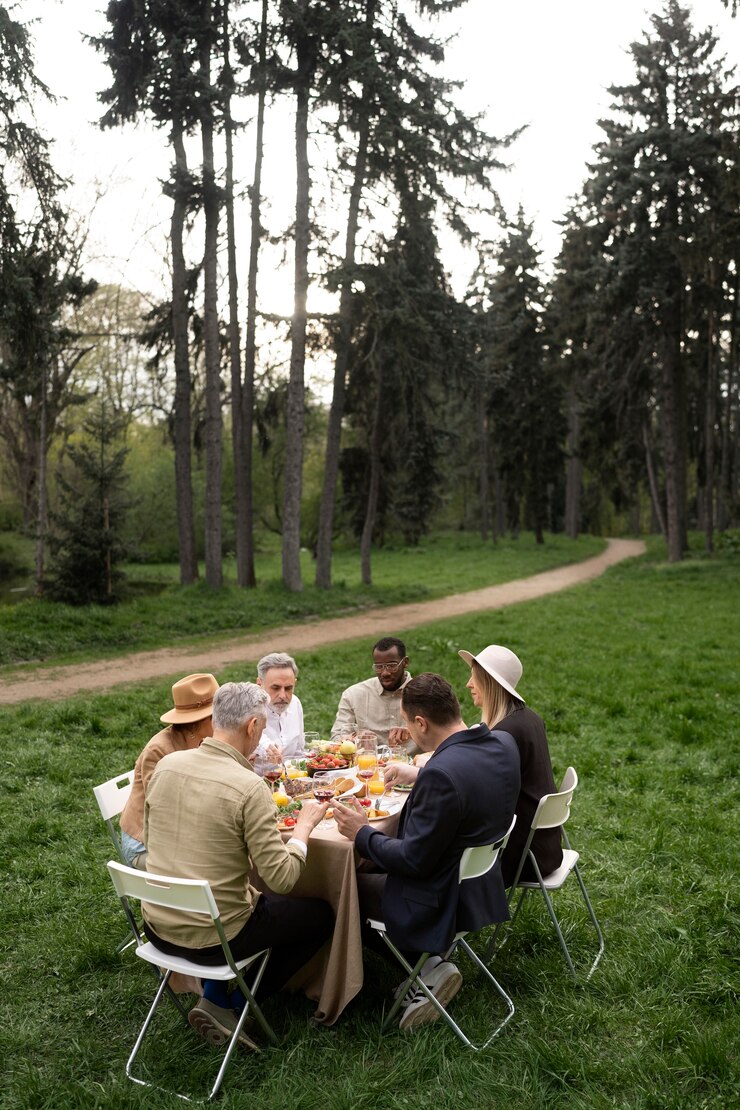 Free Photo full shot people sitting at table