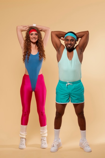 Full shot people training with  80's outfit