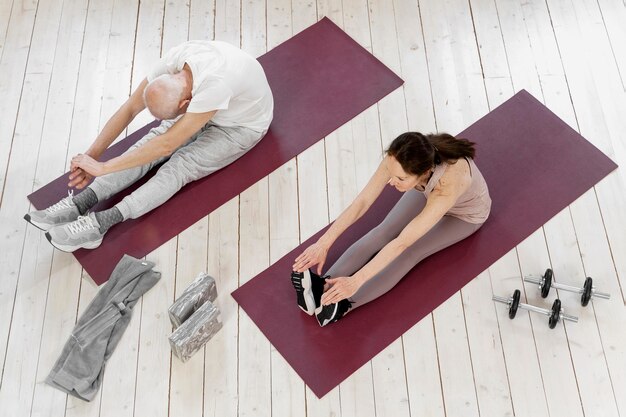 Full shot people working out together