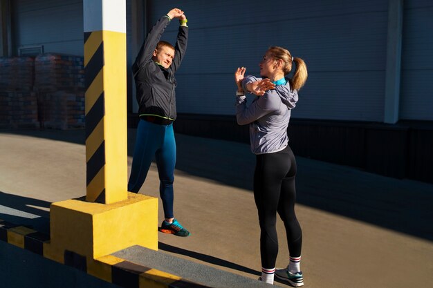 Full shot people working out together