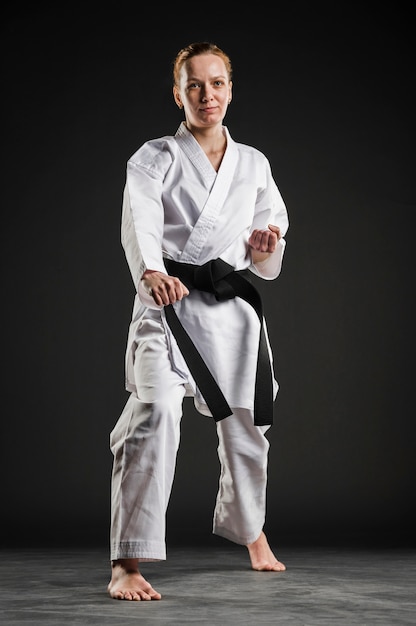 Full shot of professional karate woman
