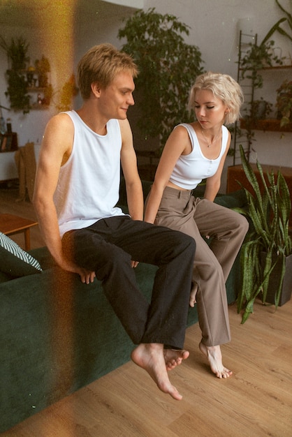 Full shot romantic couple indoors