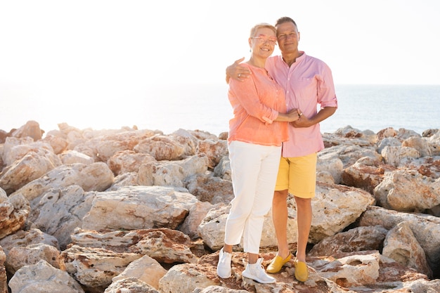 Full shot senior couple posing together