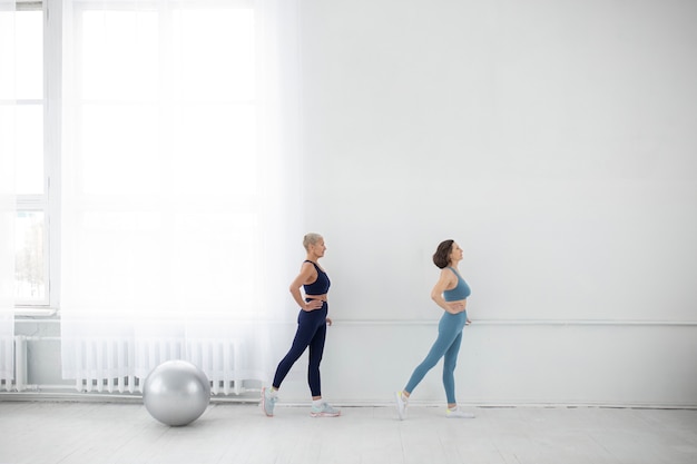 Full shot senior women training together