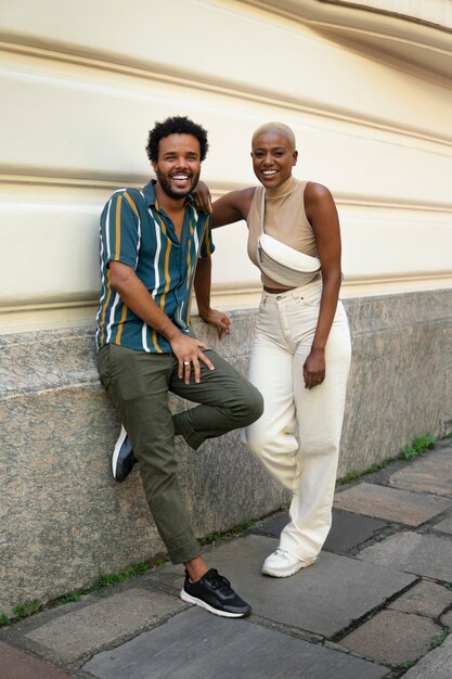 full shot smiley couple outdoors