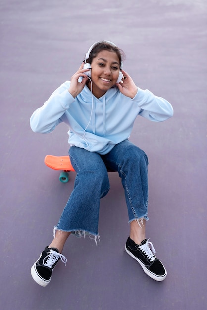 Full shot smiley girl posing