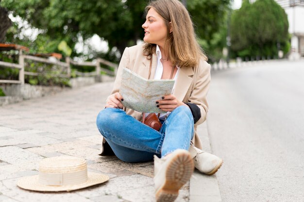 Full shot smiley woman outdoors