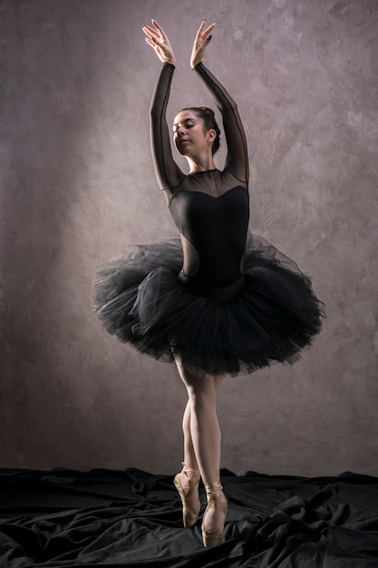 Free photo full shot standing ballet posture