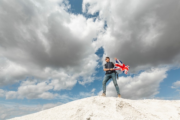 Full shot traveler waiving flag outdoor