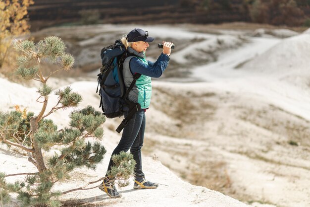 Full shot traveler with backpack outdoor