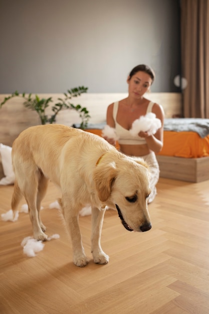 Full shot upset woman holding stuffing