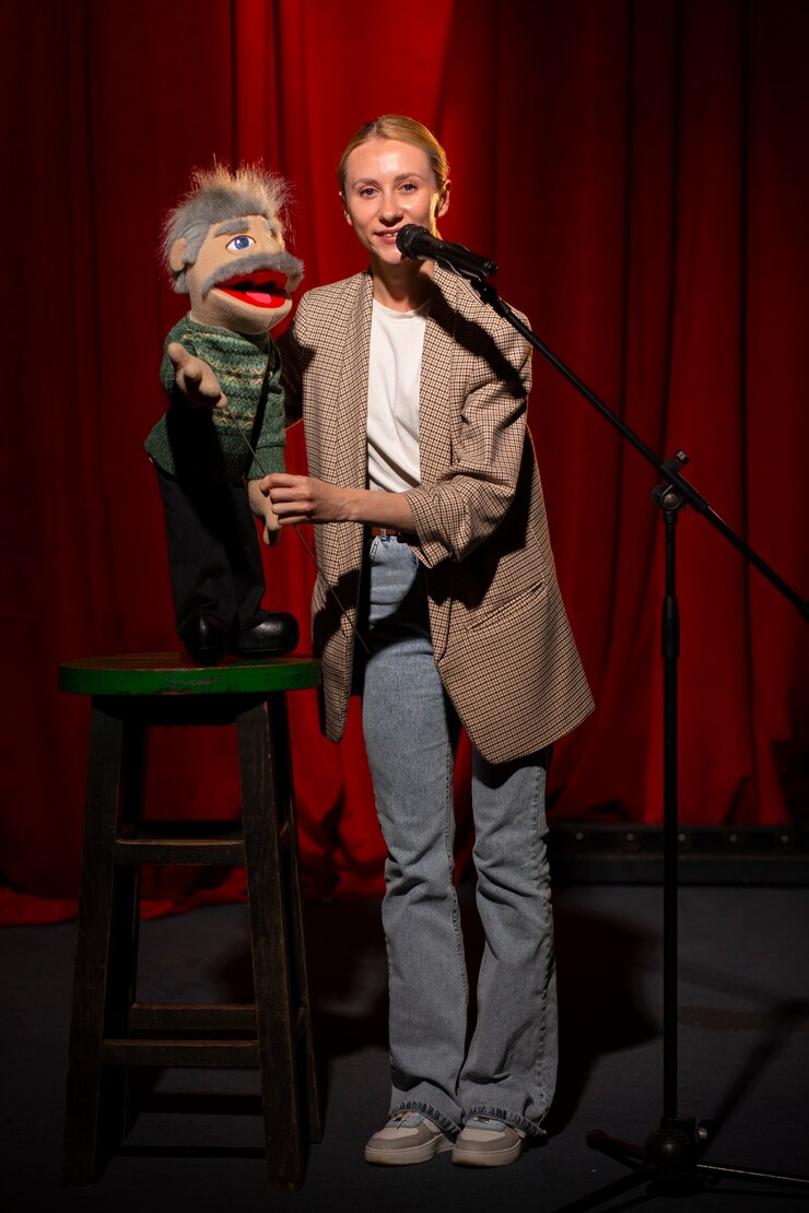 Free Photo full shot woman being ventriloquist