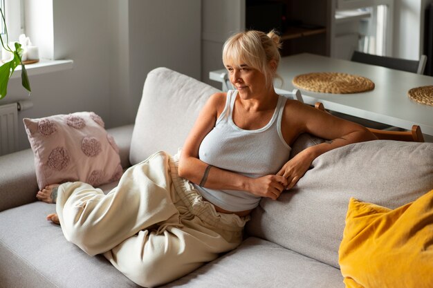 full shot woman chilling at home