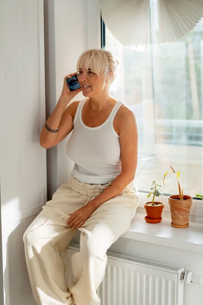 full shot woman chilling at home