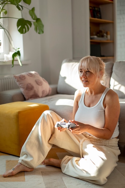 full shot woman chilling at home
