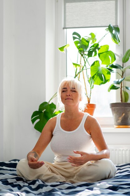 full shot woman chilling at home