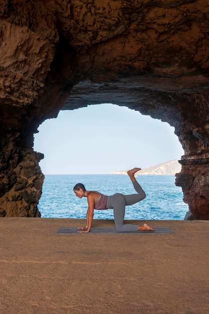 Full shot woman exercising outside