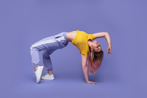 Full shot woman moving in studio